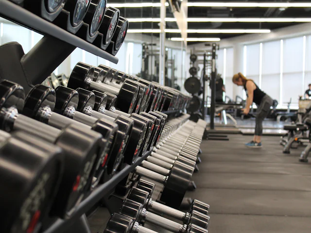 Fitness centre with rubber gym flooring under weights and equipment