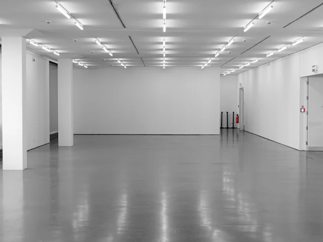 Polished concrete floor with a reflective finish in a commercial interior